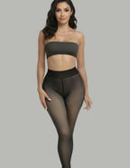 Woman wearing black sheer tights and a strapless top on a white background